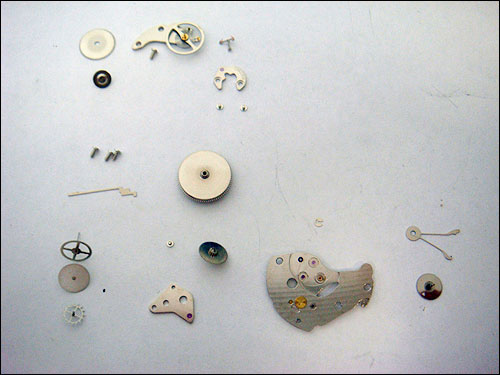 Disassembled Seiko 7S26 components