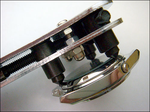 Removing the case of a Seiko 7S26 with case back removal tool